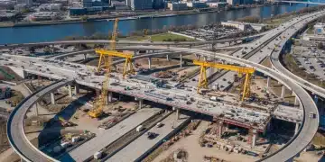 Modern highway interchange under construction, symbolizing federal infrastructure investment